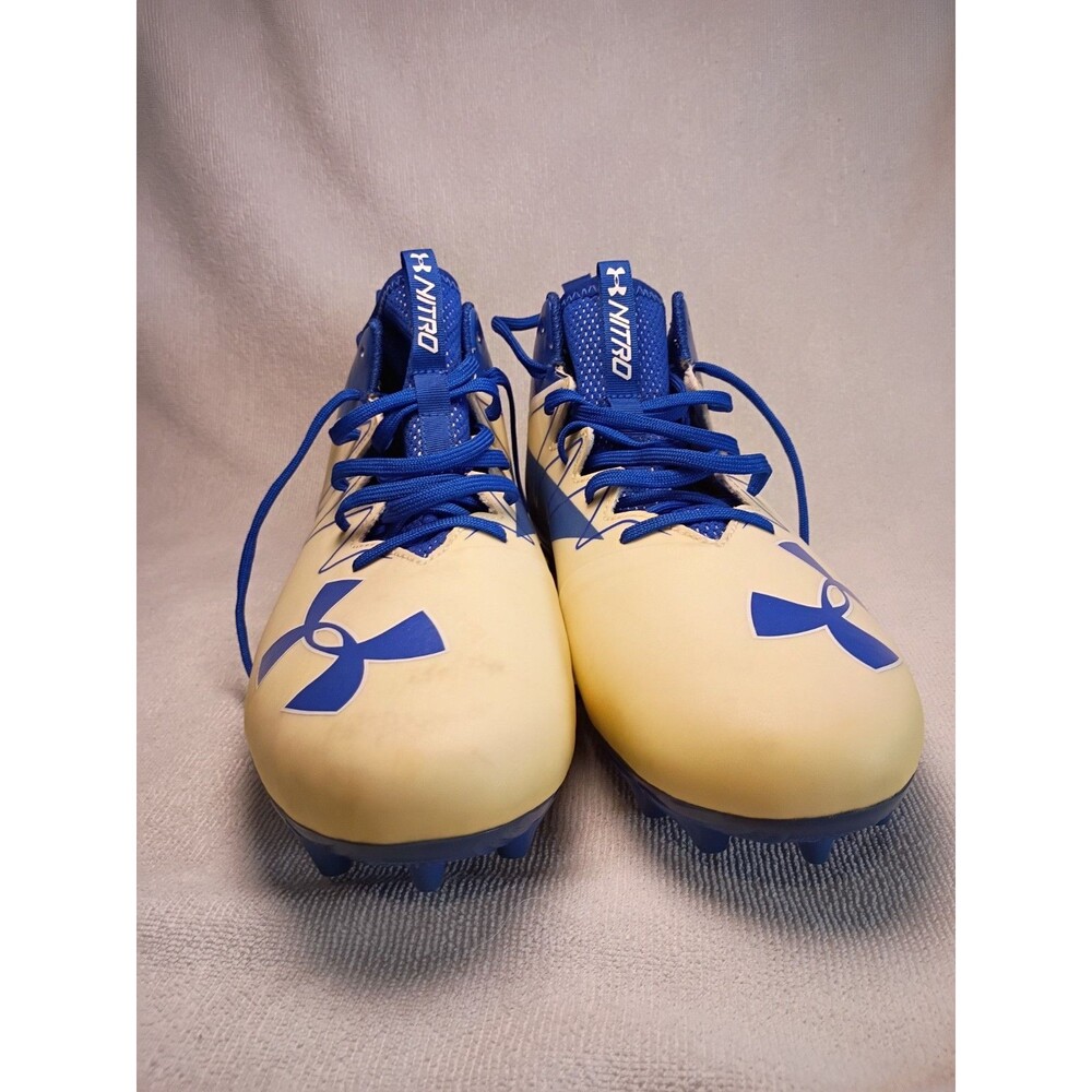 Under Armor blue and white men's cleats.
